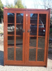 Custom Two Door Inlaid Bookcase with slab sides, gallery top and through tenons